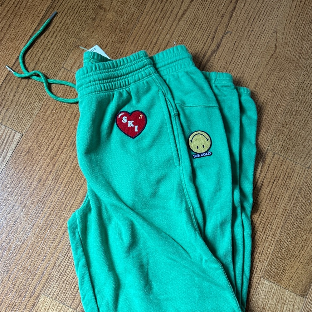 Aerie women’s Green Joggers with Fun Patches